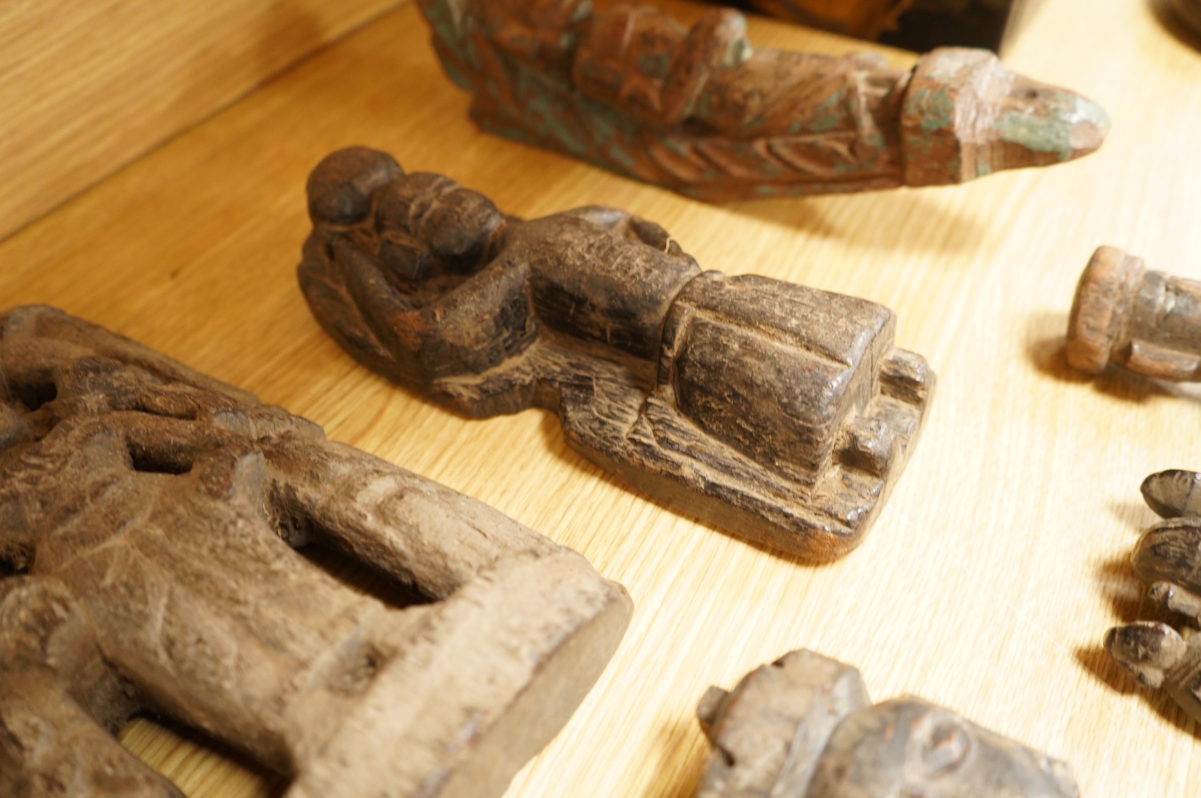 A group of Indian carved figures of deities, largest 42.5cm